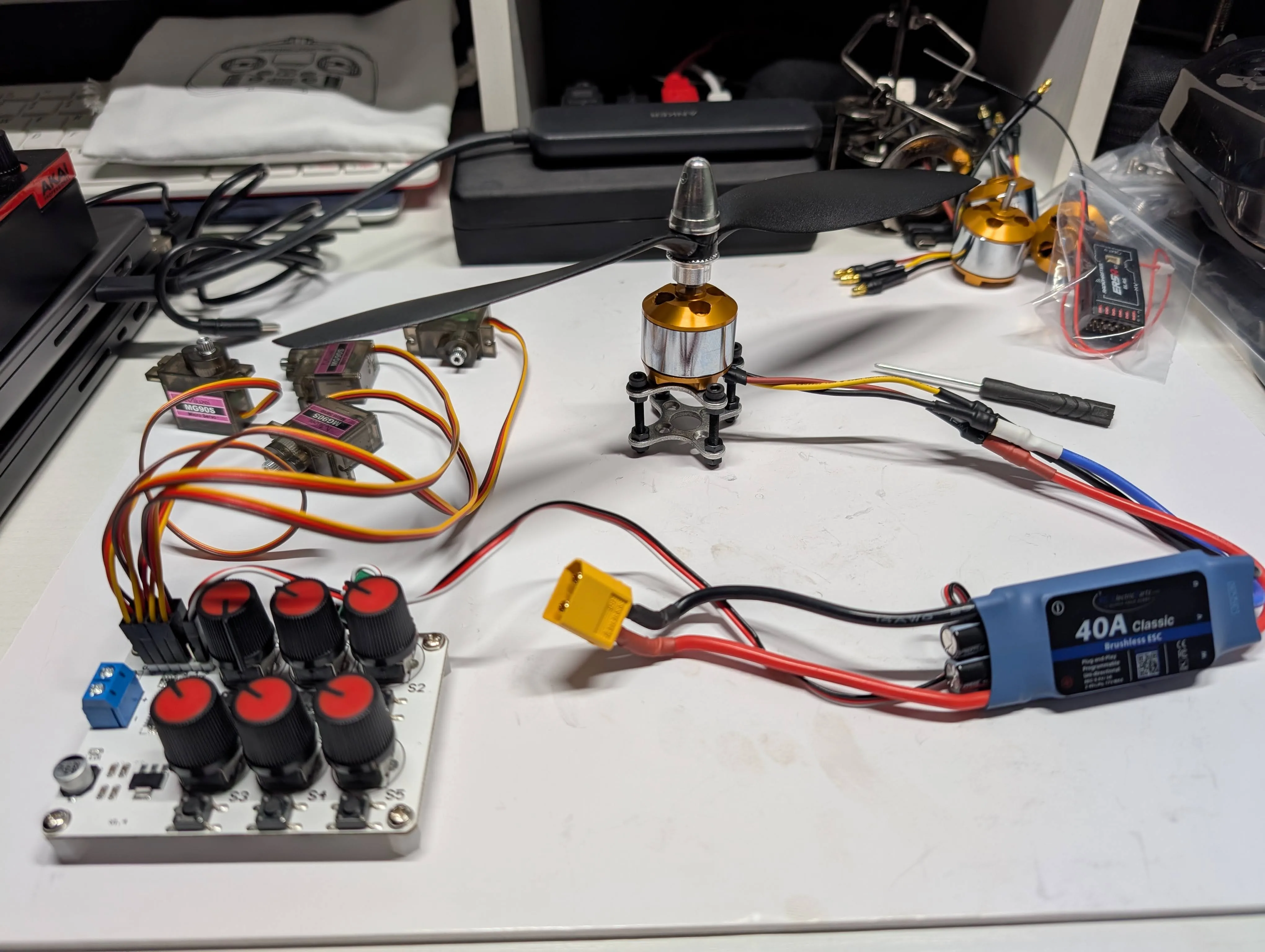 Early RC bench setup with ESC, motor, and wiring visible