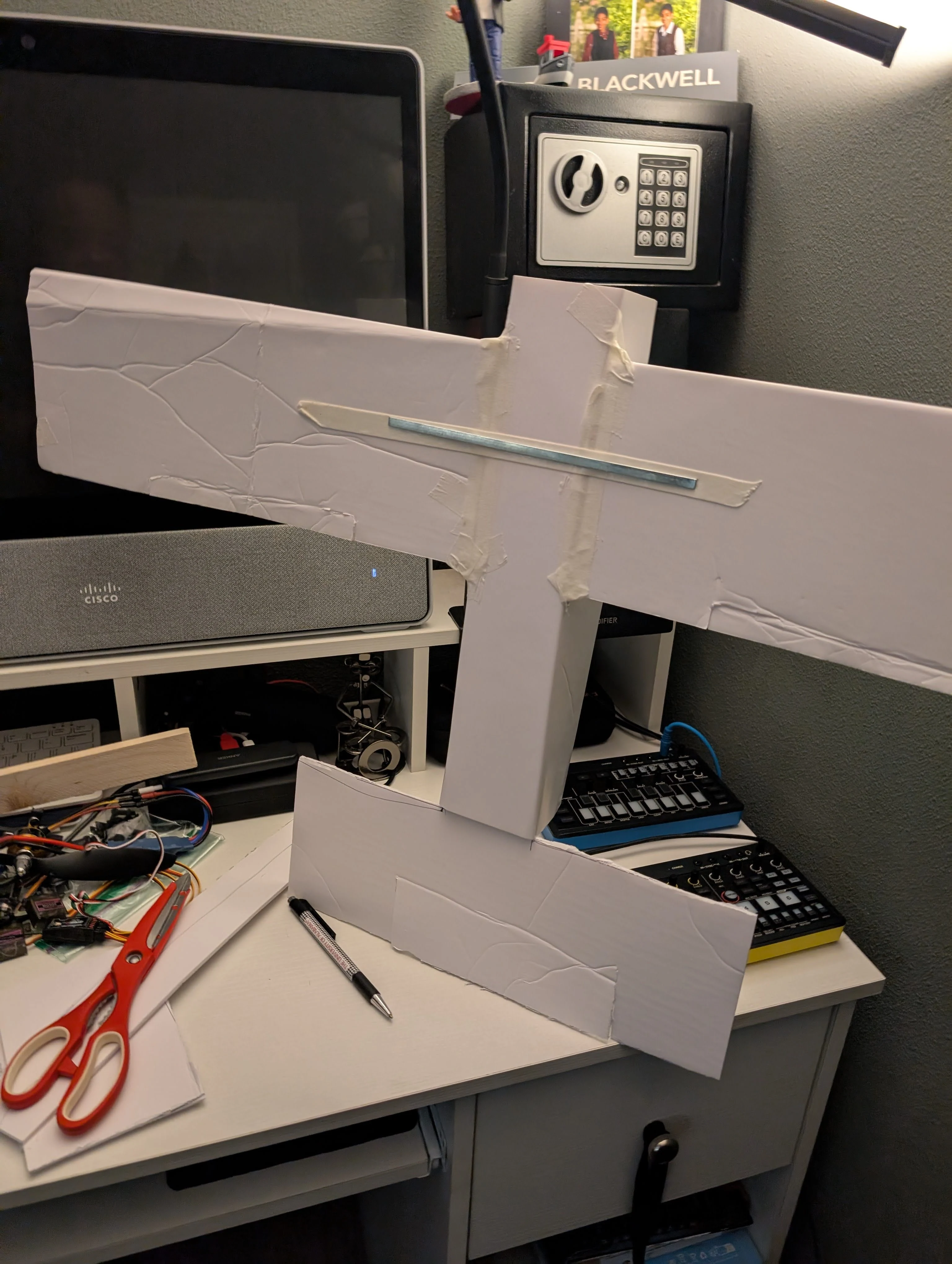 Foamboard RC airframe assembled with wings and fuselage before rudder installation