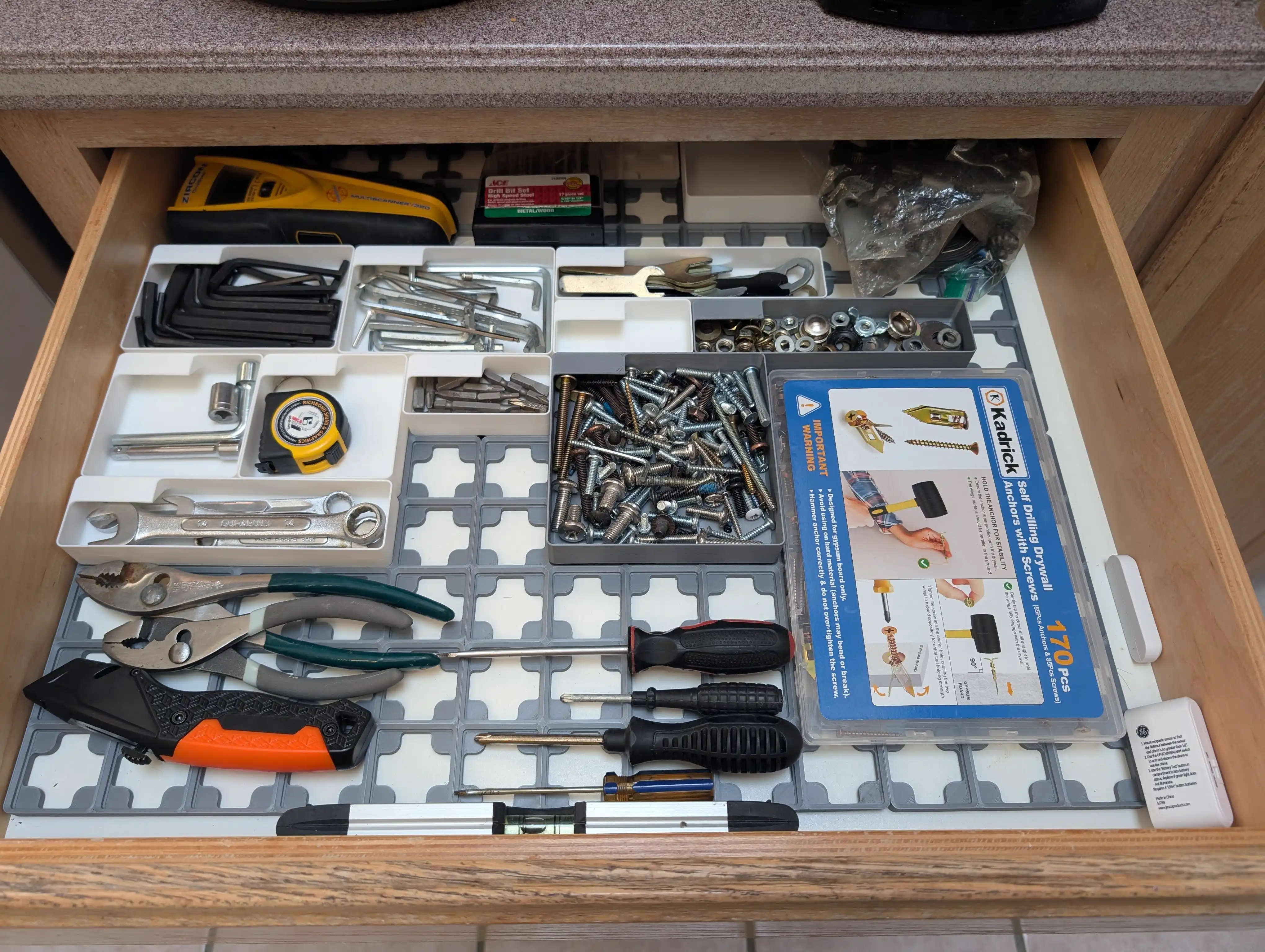 More bins and tools organized in Gridfinity junk drawer