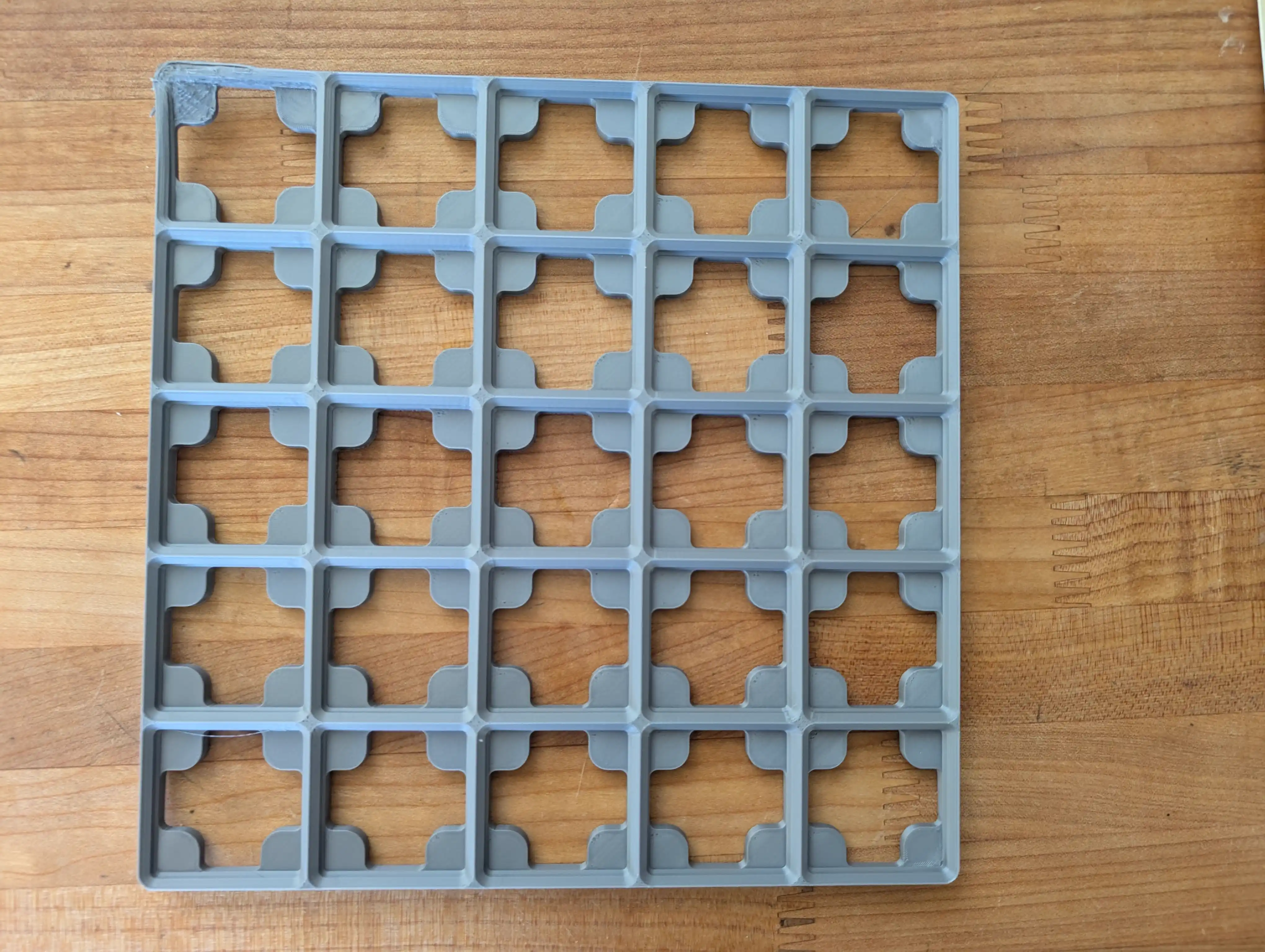 Top-down view showing warping pattern on baseplate print