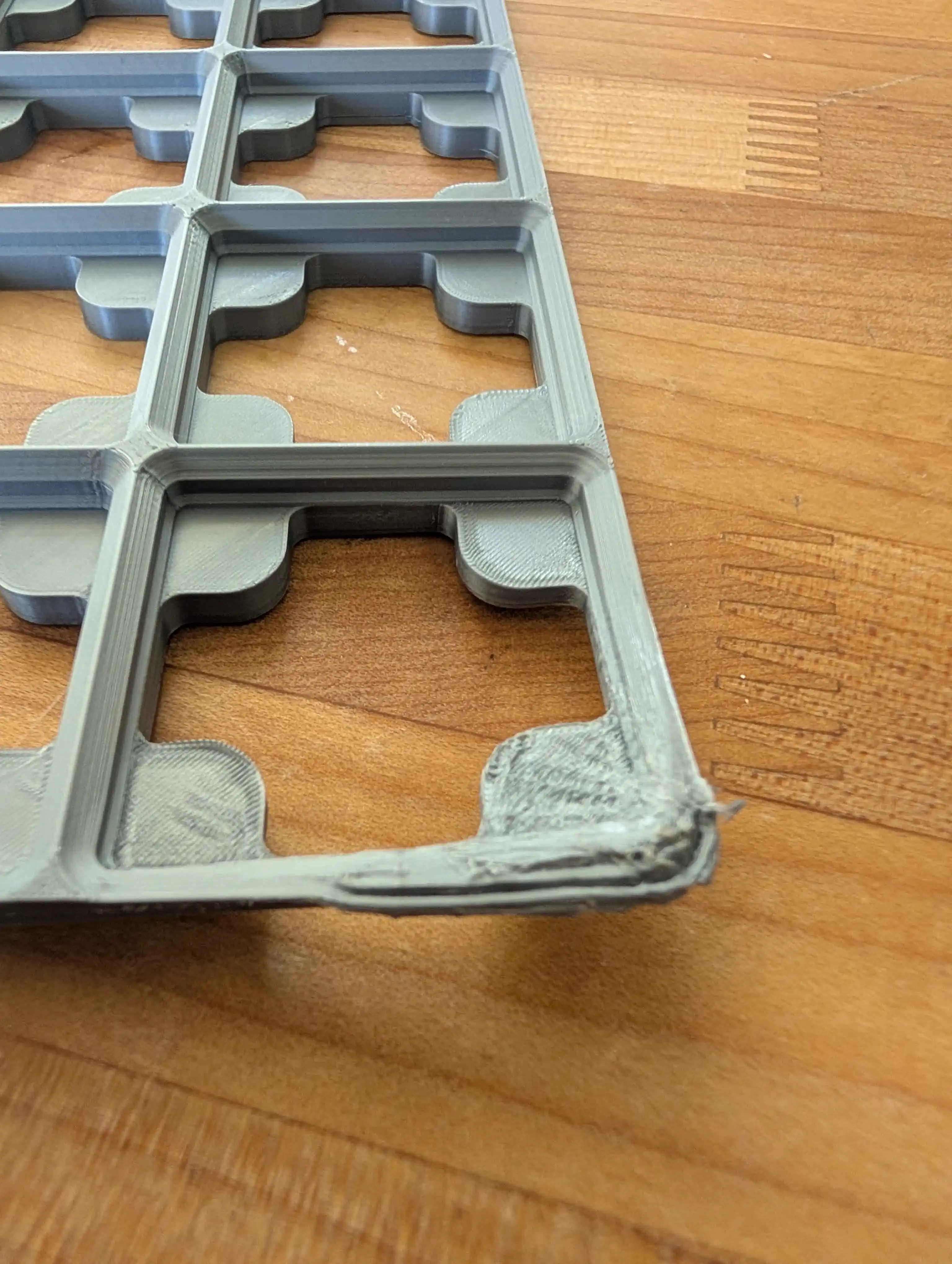 Closeup of corner warping during a 3D print