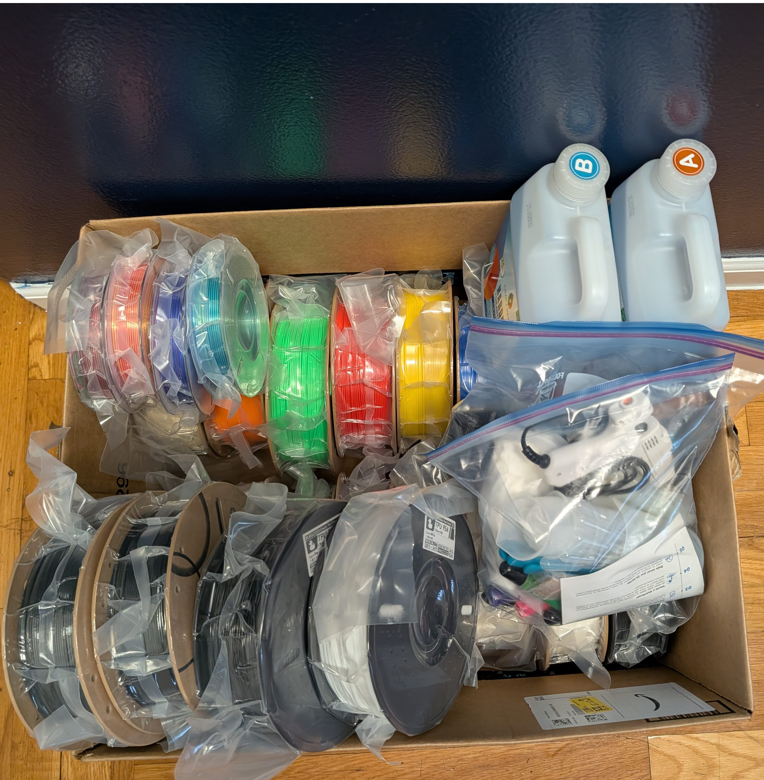 Consumables and supplies organized in a separate vertical storage box