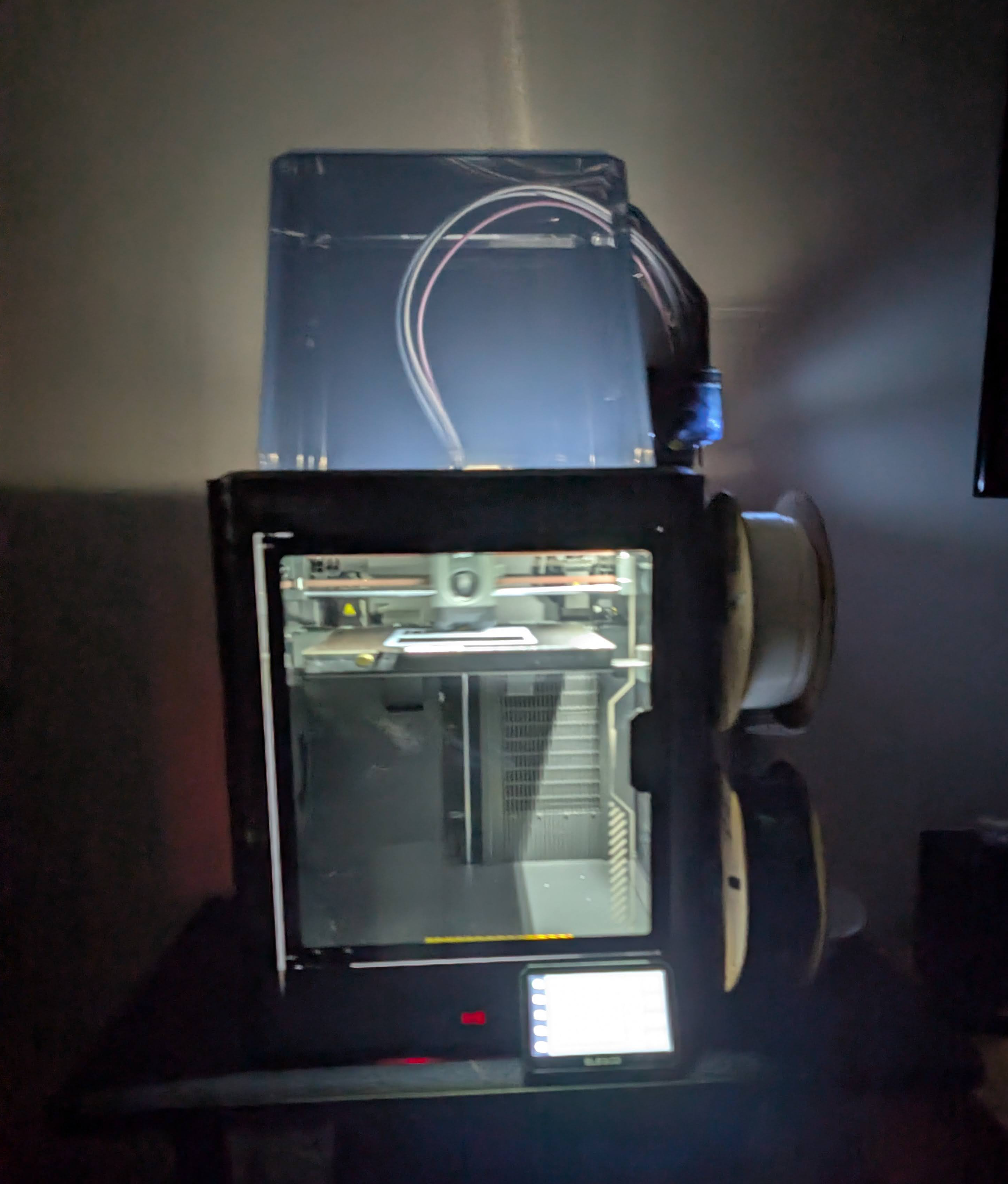 Printer running in a darker room while actively printing