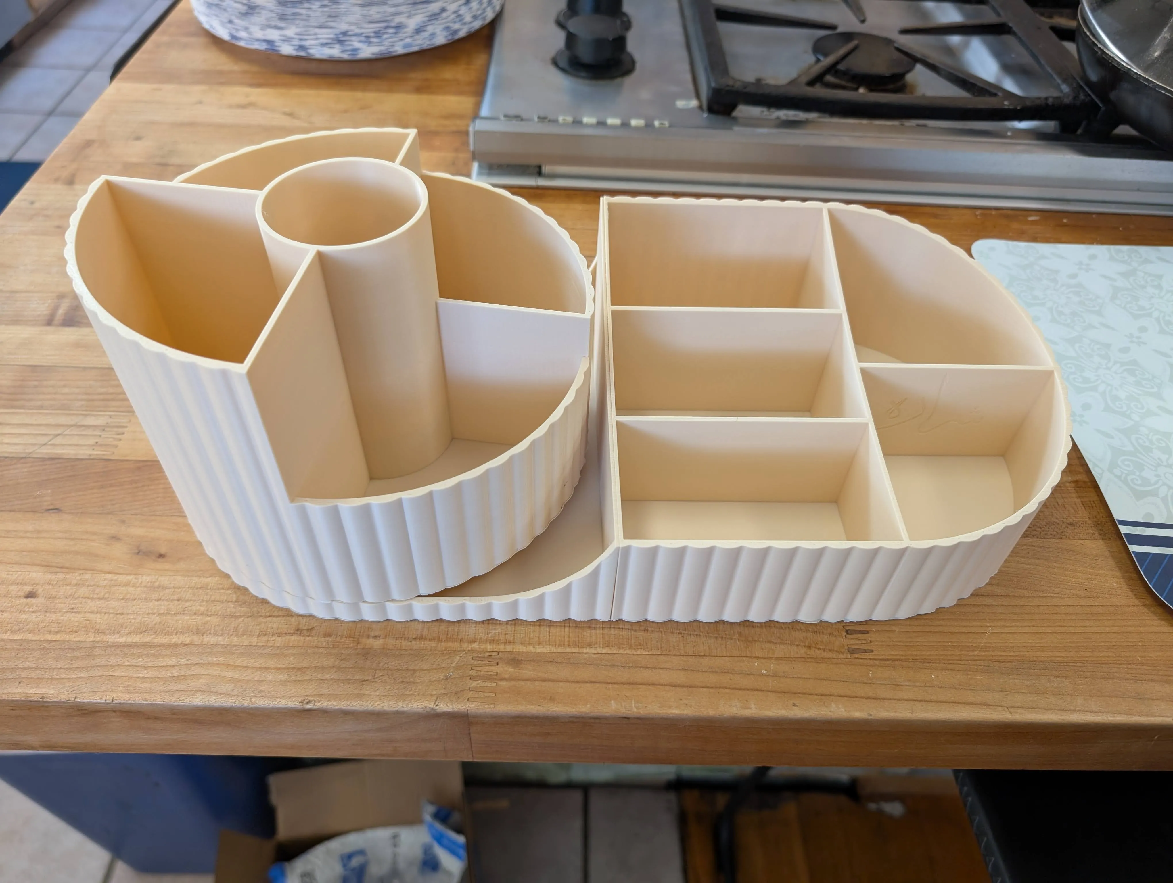 Completed 3D-printed makeup organizer assembled and filled with makeup