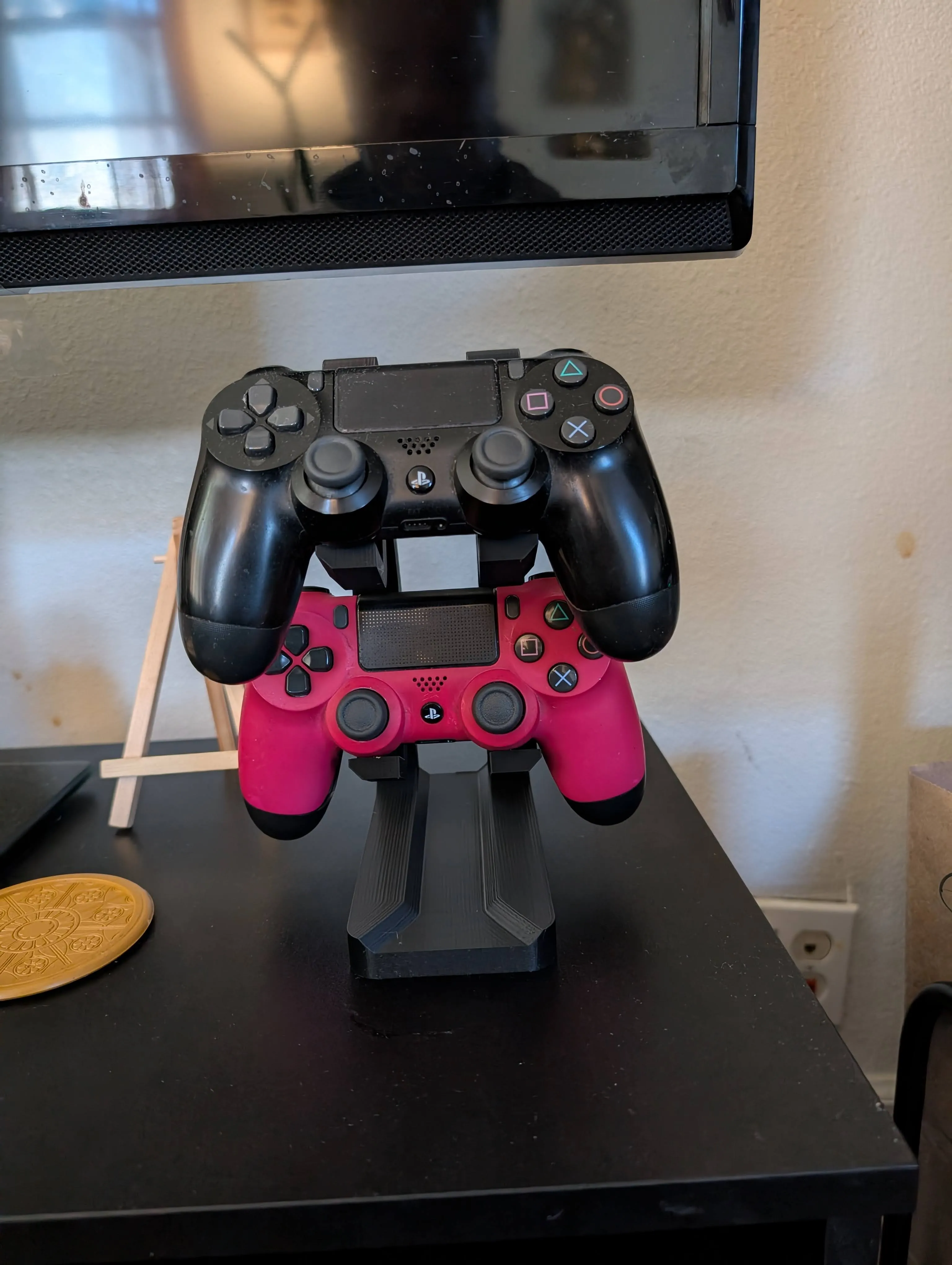 3D-printed dual PlayStation controller holder in white