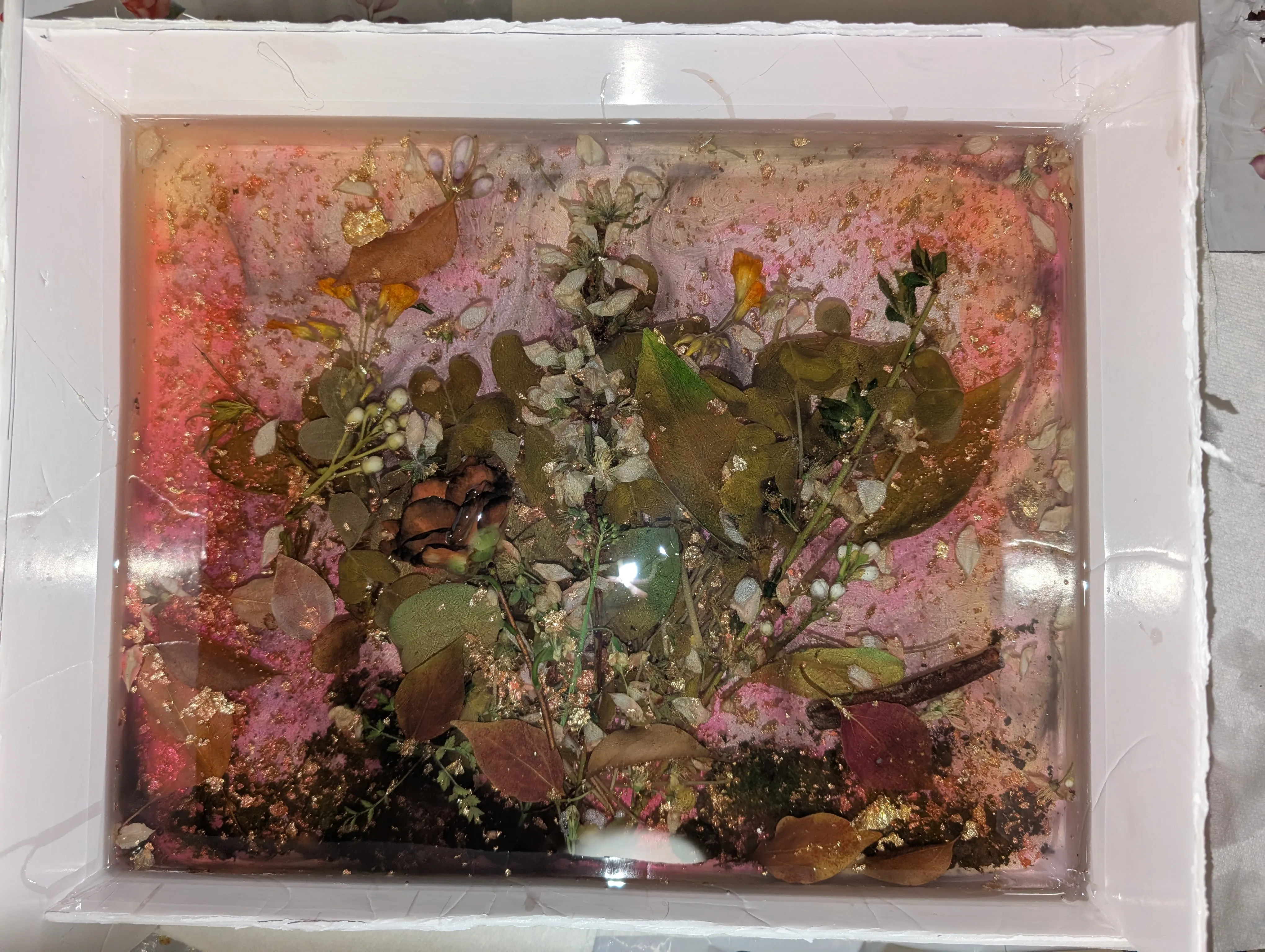 All epoxy poured and curing in the foam board box with flowers preserved inside