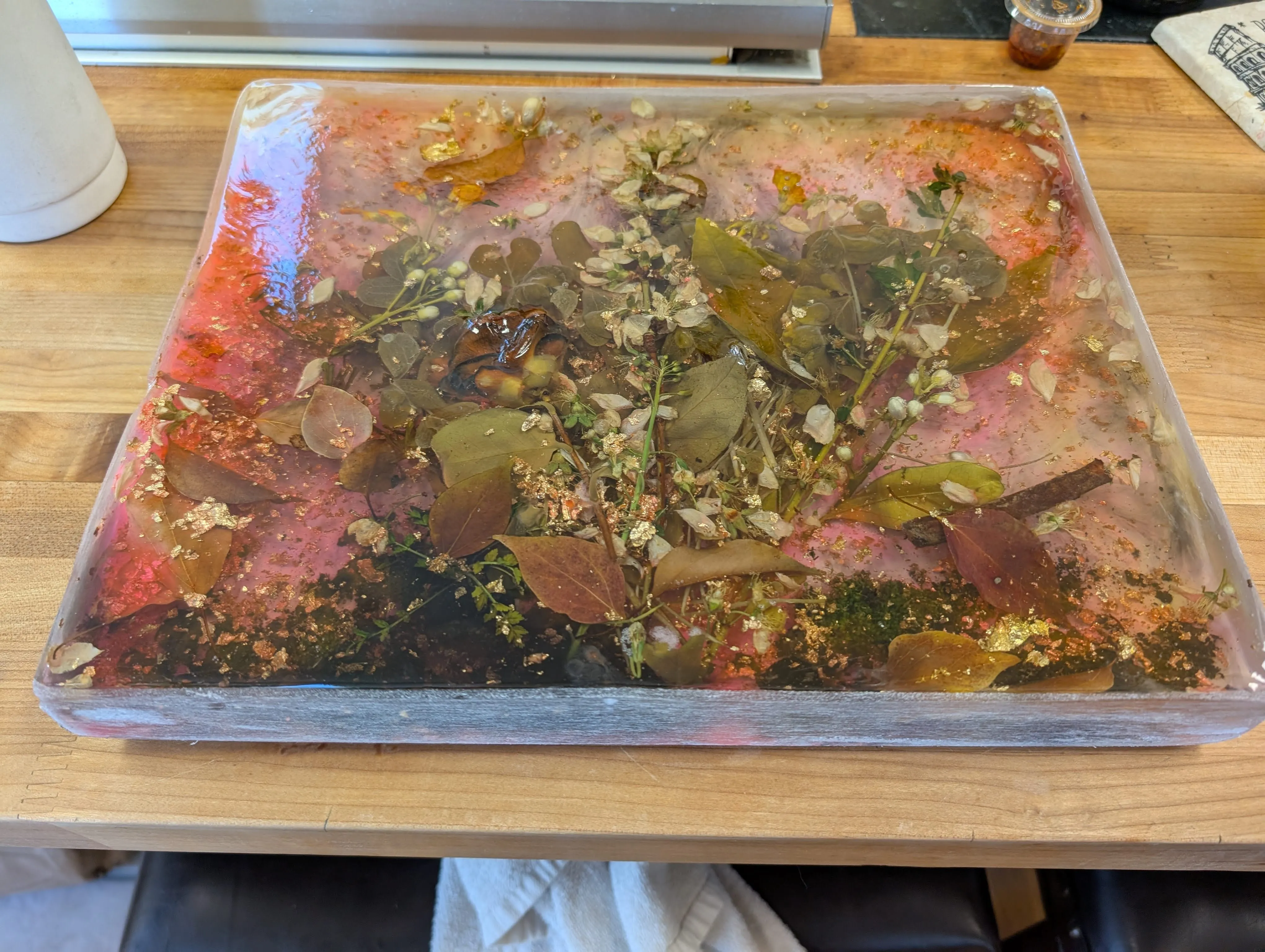 Close-up of the sanded edges of the epoxy art piece with clean finish