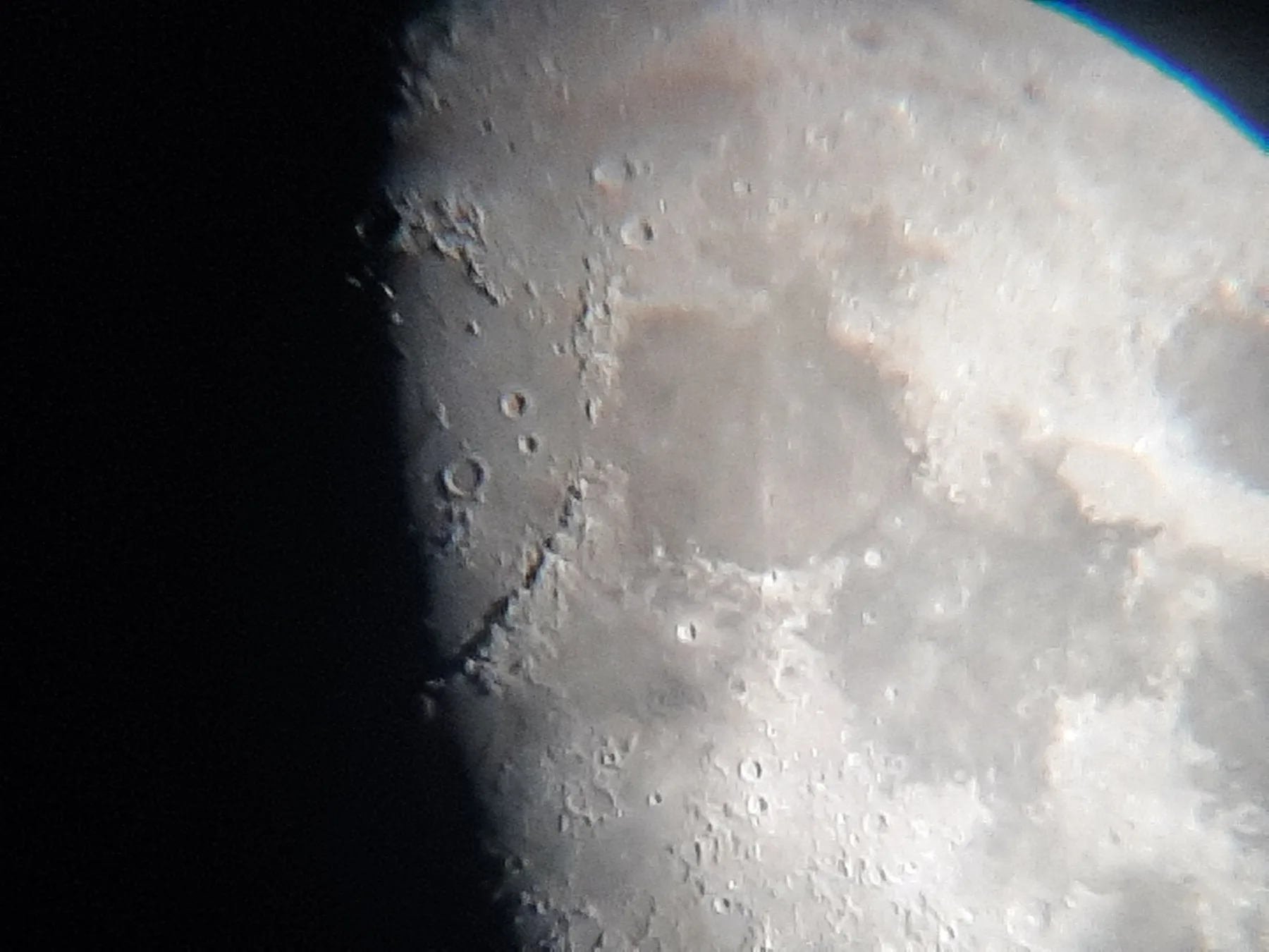 A close view of the Moon's craters photographed through a telescope